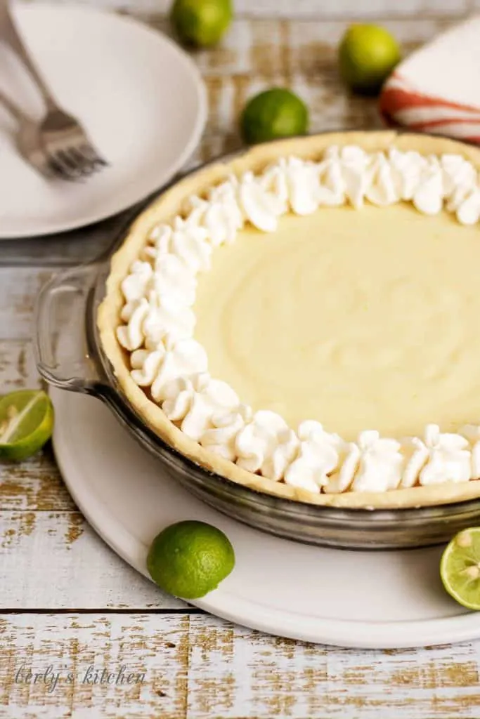 A homemade silky smooth key lime pie that's creamy, sweet, and tangy and is prepared with authentic key lime juice. It's the perfect for pie spring!