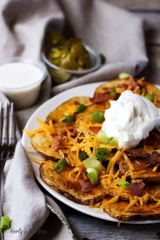 Don't be caught off-guard for your next game day party. Bring along our oven baked loaded potato nachos piled high with melted cheese and a whole lot more!