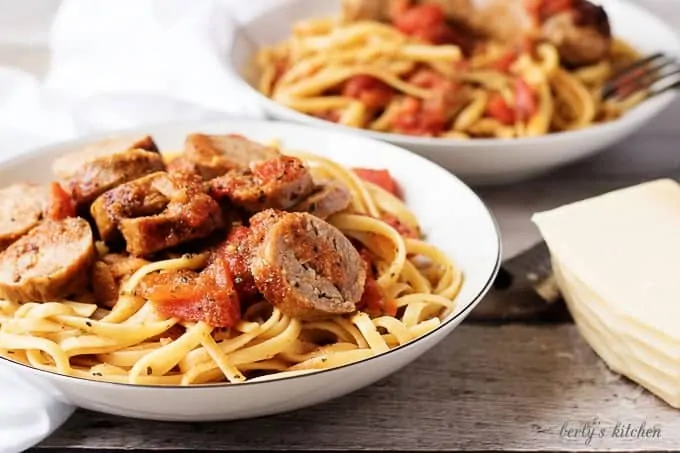 A meaty, spicy italian sausage and tomato linguine recipe that's perfect for a quick weeknight dinner. Proving good food doesn't have to take all day!