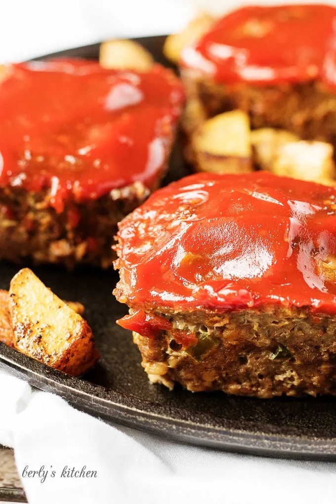 Individual mini meatloaves of savory hamburger meat, seasonings, and zesty ketchup. They're easy to prepare and perfectly pre-portioned.