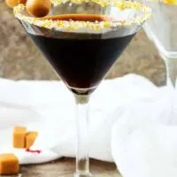 Salted caramel coffee martini in sugar rimmed glass.