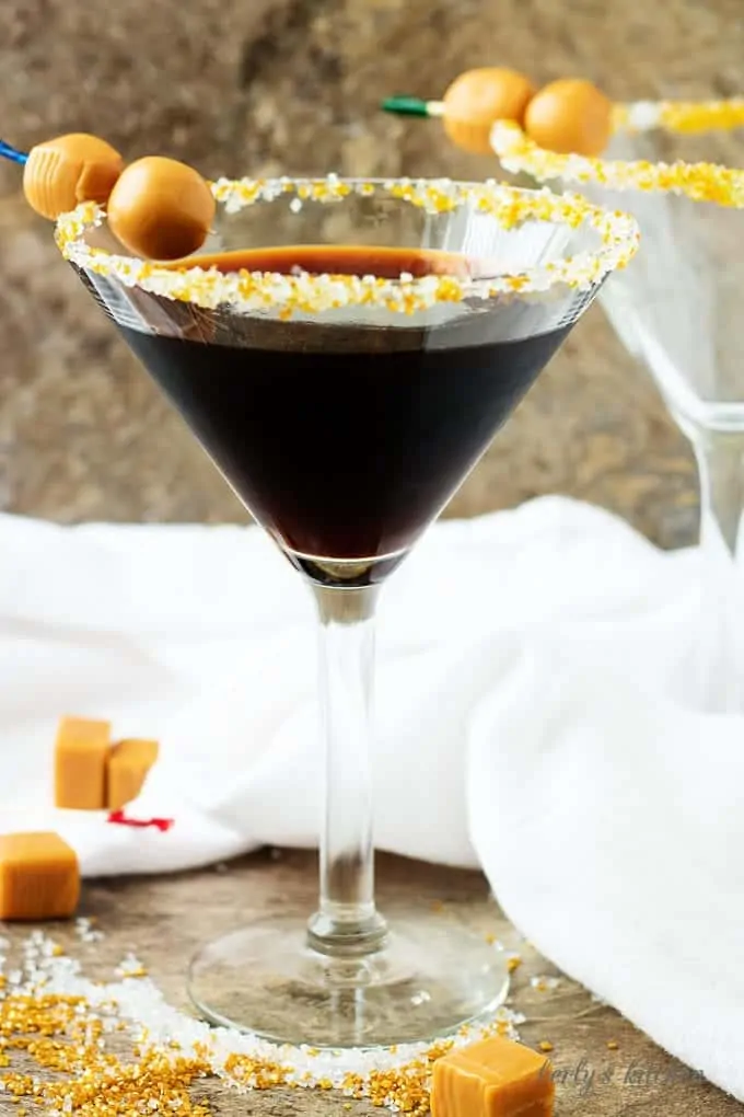 Salted caramel coffee martini in sugar rimmed glass.