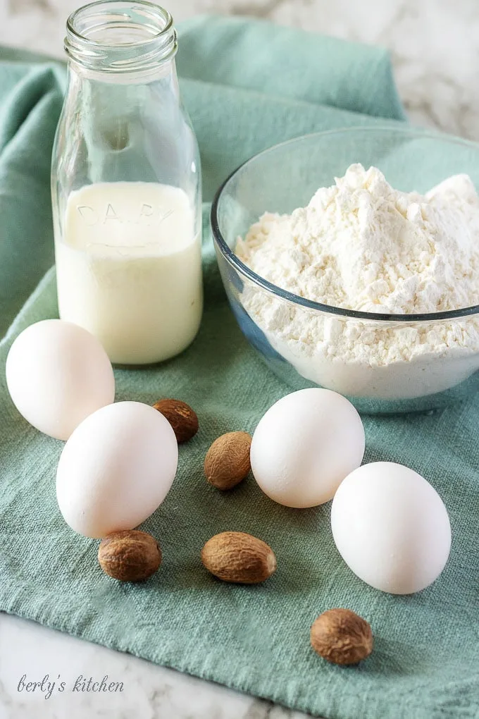 The spaetzle ingredients, like flour, milk, and eggs all prepped up and ready to prepare the recipe.