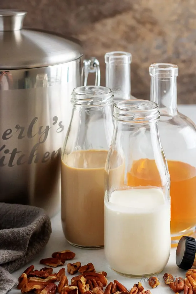 A photo showing the vodkas and heavy cream used to create the pecan pie martini.