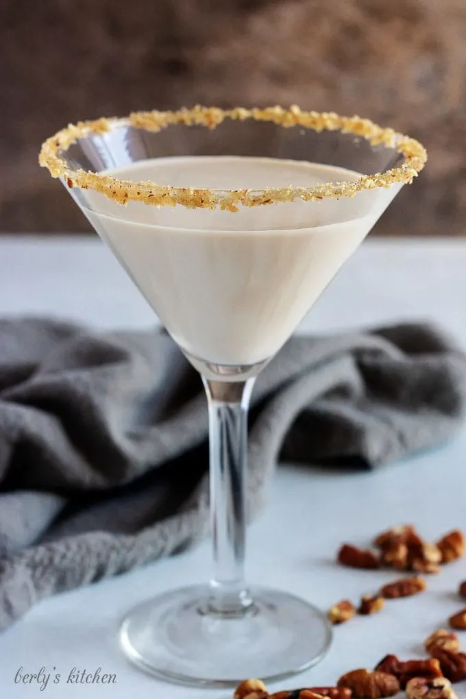 A close-up picture of the pecan pie martini in a long-stem martini glass.