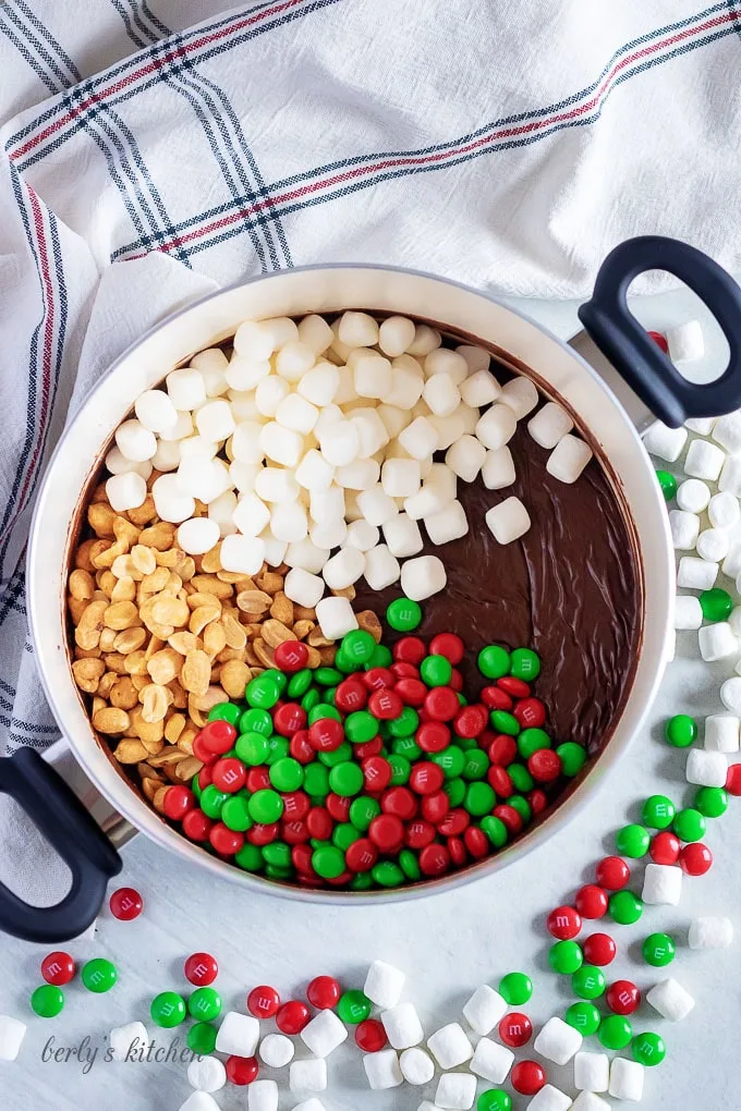 The chips are melted in a large saucepan and are about to be mixed with the other ingredients.