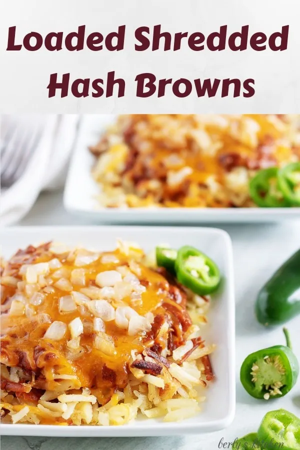 Two bowls of loaded shredded hash browns topped with cheese and onions.