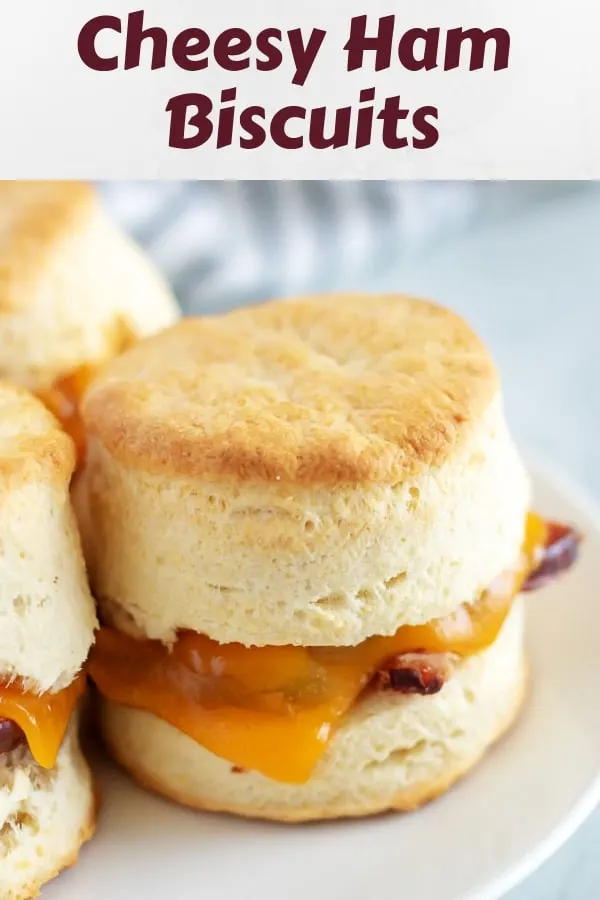 A close-up shot of the cheesy ham biscuits with gooey cheese.