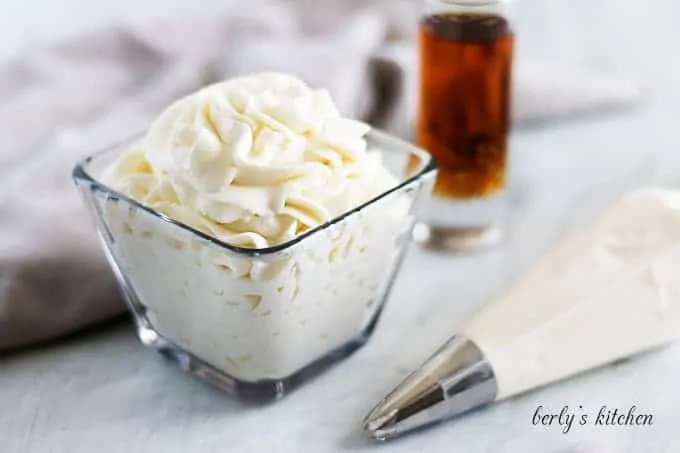 A square glass dish filled with the amaretto whipped topping.