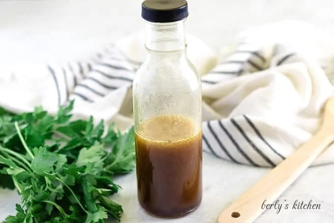 The finished asian salad dressing stored in a sealed dressing bottle.