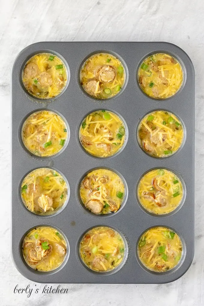 The egg mixture has been transferred to a muffin tin.