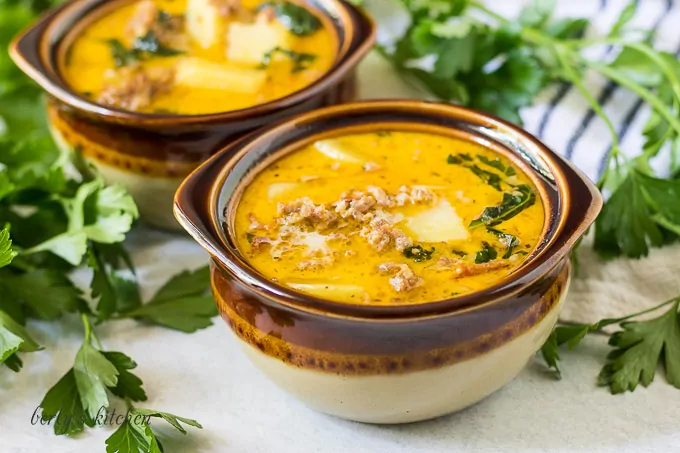 Two small bowls of the instant pot zuppa toscana recipe.