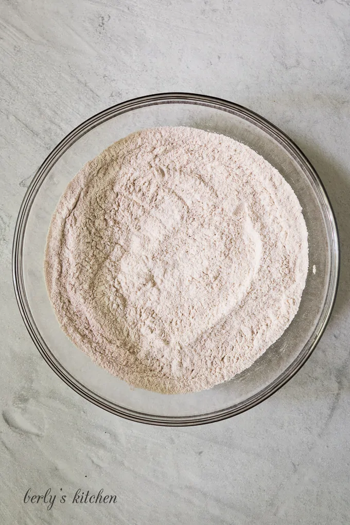 Flour and other dry ingredients in a large mixing bowl.