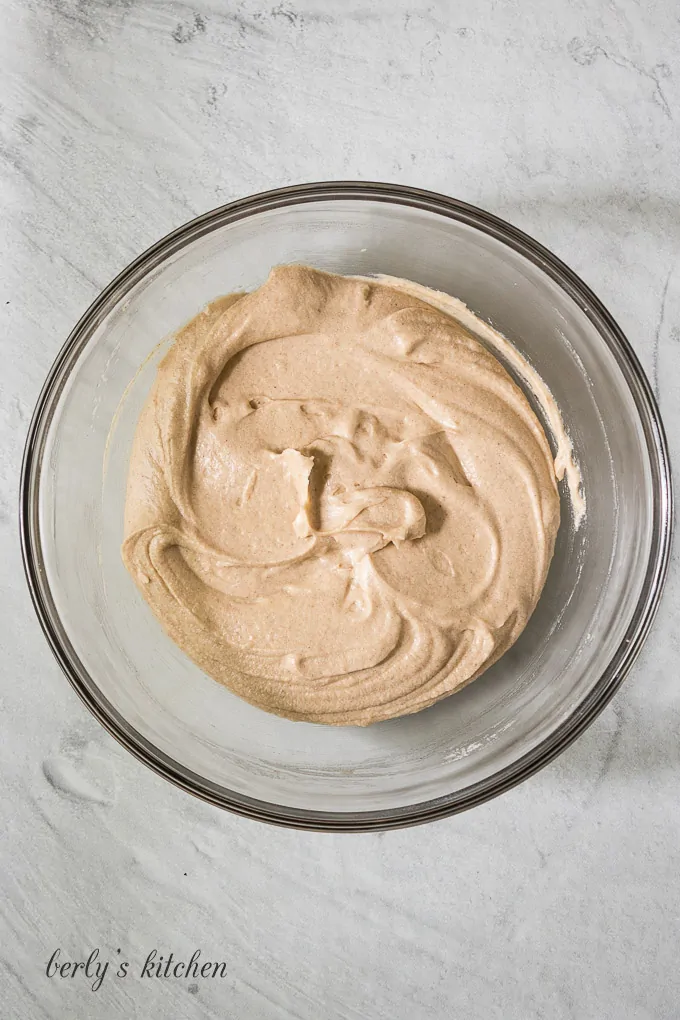 The donut batter is ready to be added to the pan.