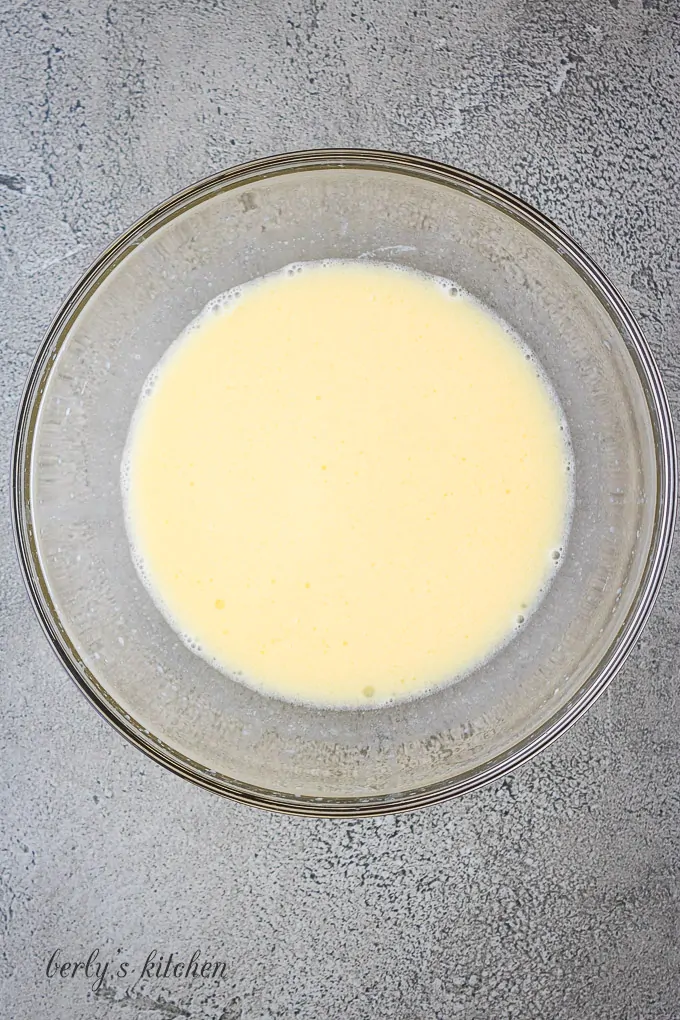 Eggs, and other wet ingredients in a large mixing bowl.