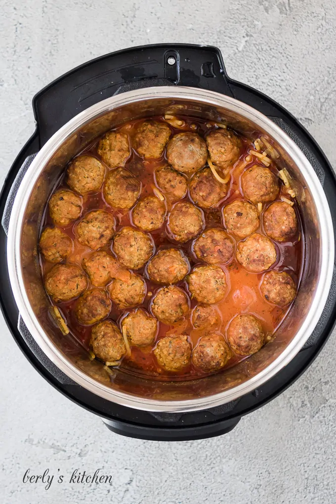 The spaghetti and meatballs after cooking in the pressure cooker.