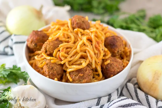 The finished instant pot spaghetti with meatballs in a bowl.