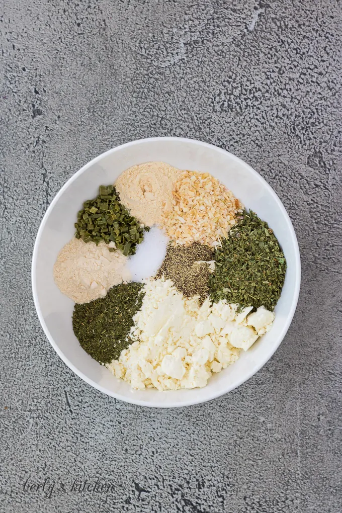 All of the spices portioned out on a small plate.