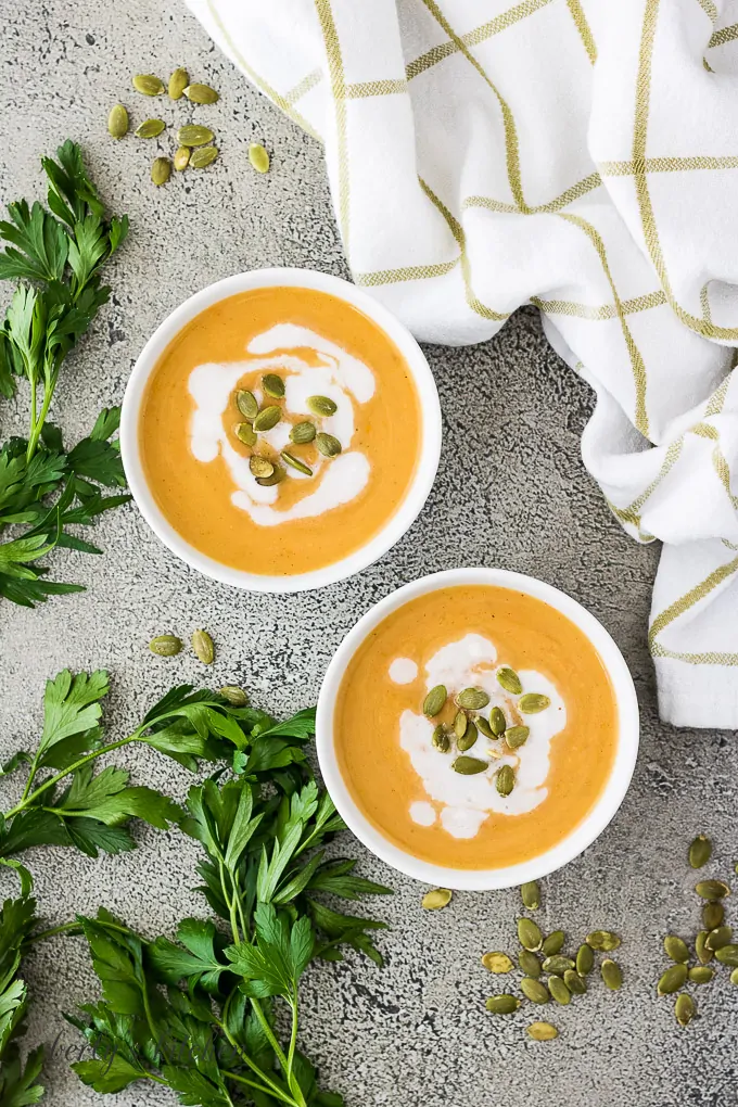 An aerial view of the finished soup with toasted seeds.