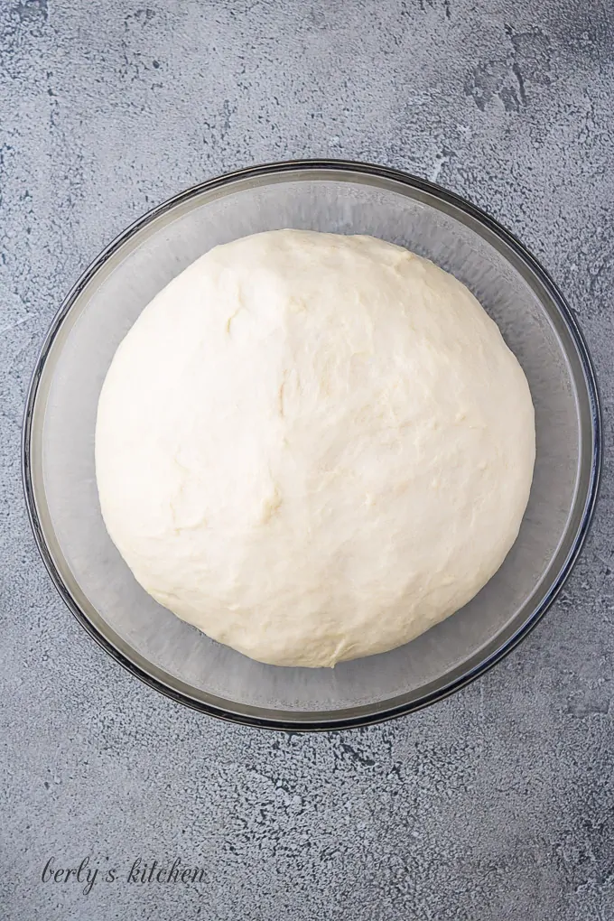 The dough has doubled in size after an hour of rising.