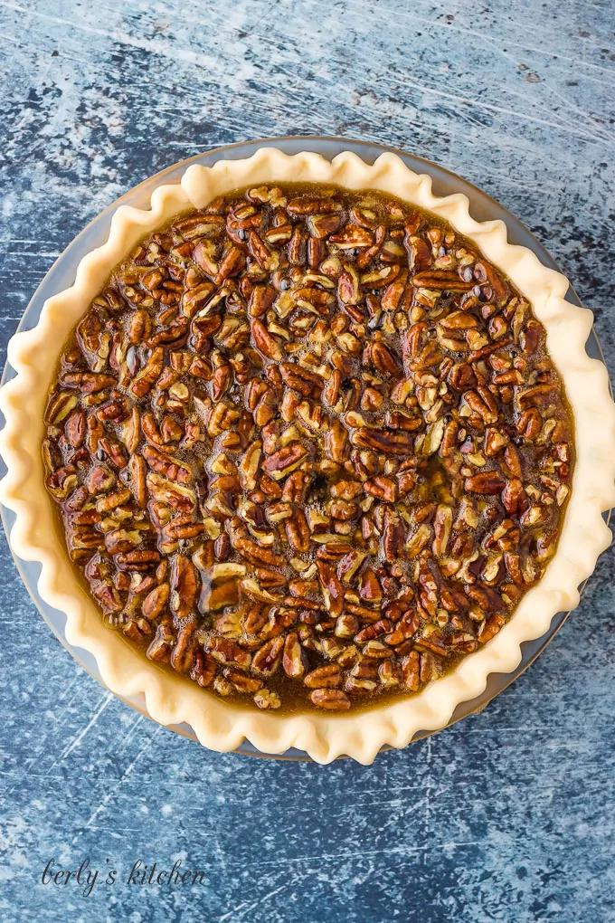 The filling has been poured into an unbaked pie crust.