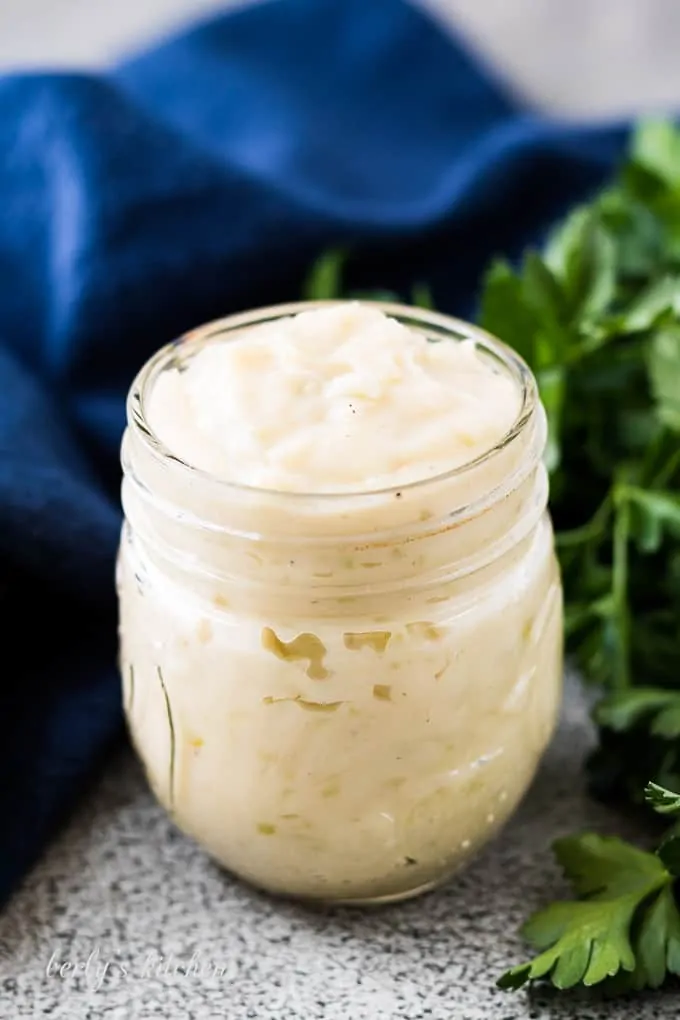 Homemade condensed cream of celery soup in a mason jar.