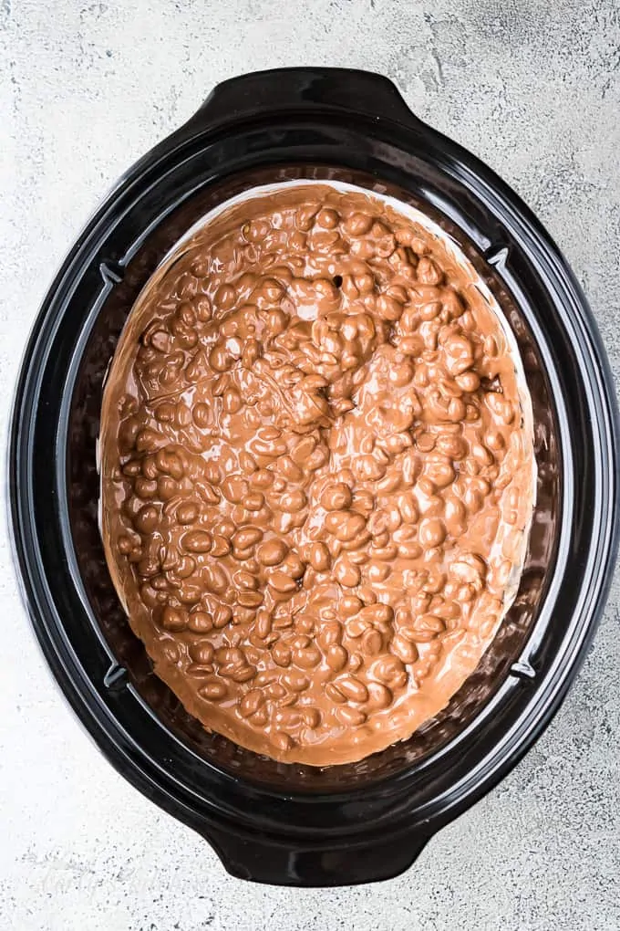 The melted chocolate is ready to be formed into candies.