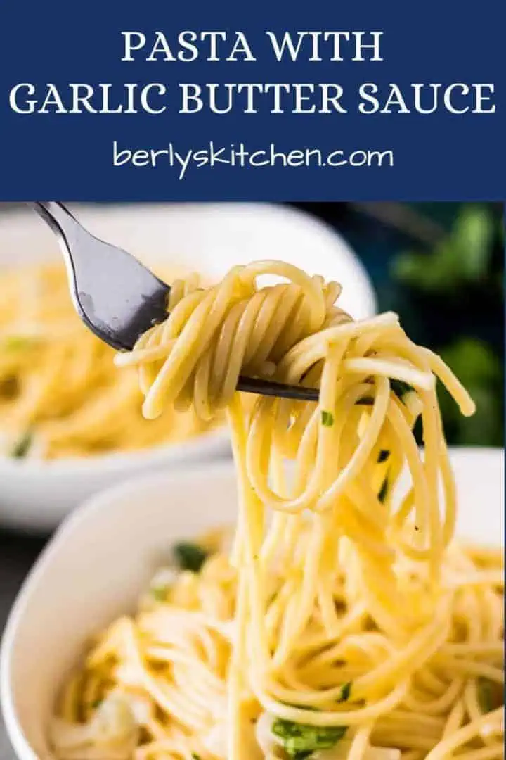 Pasta noodles tossed with garlic butter sauce and fresh parsley.