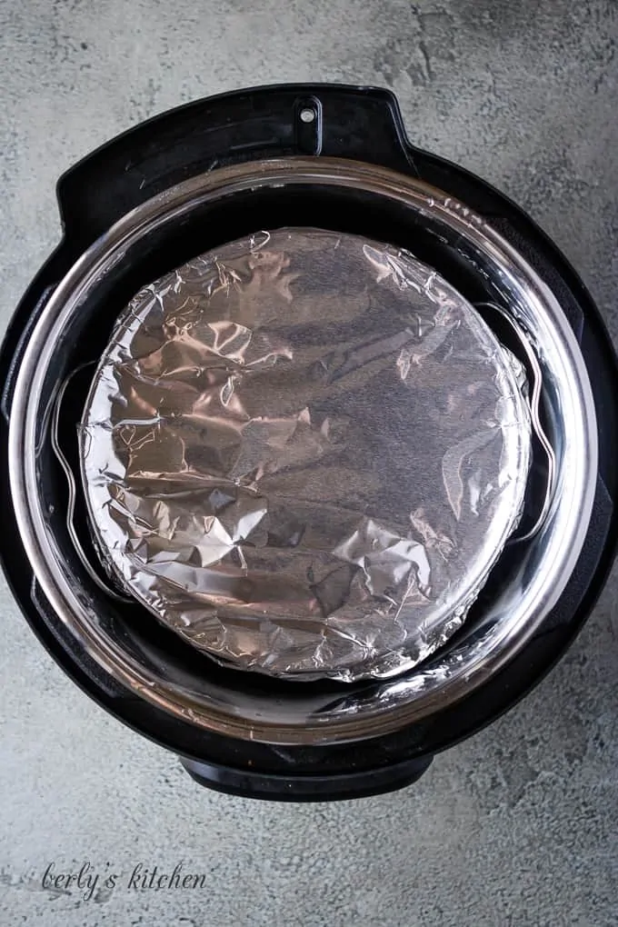 The baking dish covered in foil and moved to a pressure cooker.