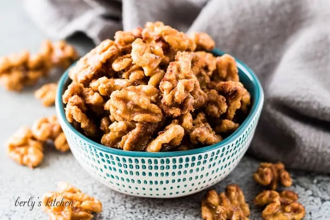 The maple glazed candied walnuts in a small decorative bowl.