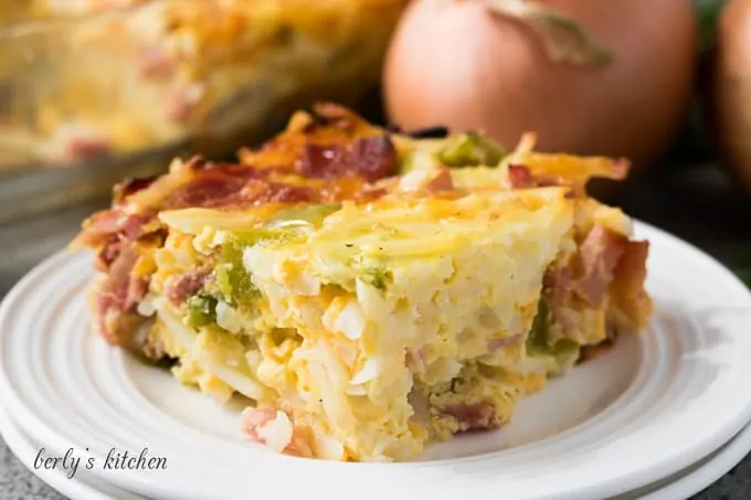 A piece of breakfast casserole in a small plate.