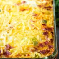 The baked cheesy breakfast casserole in a pan.