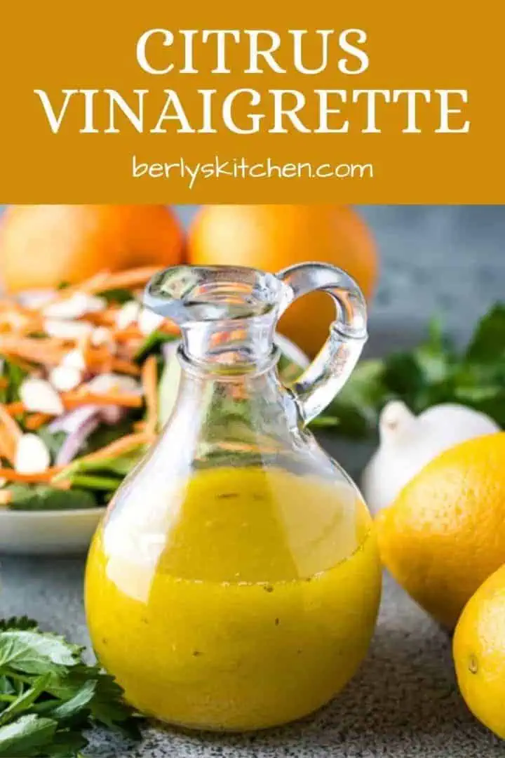 The orange citrus vinaigrette surrounded by fresh lemons and garlic.