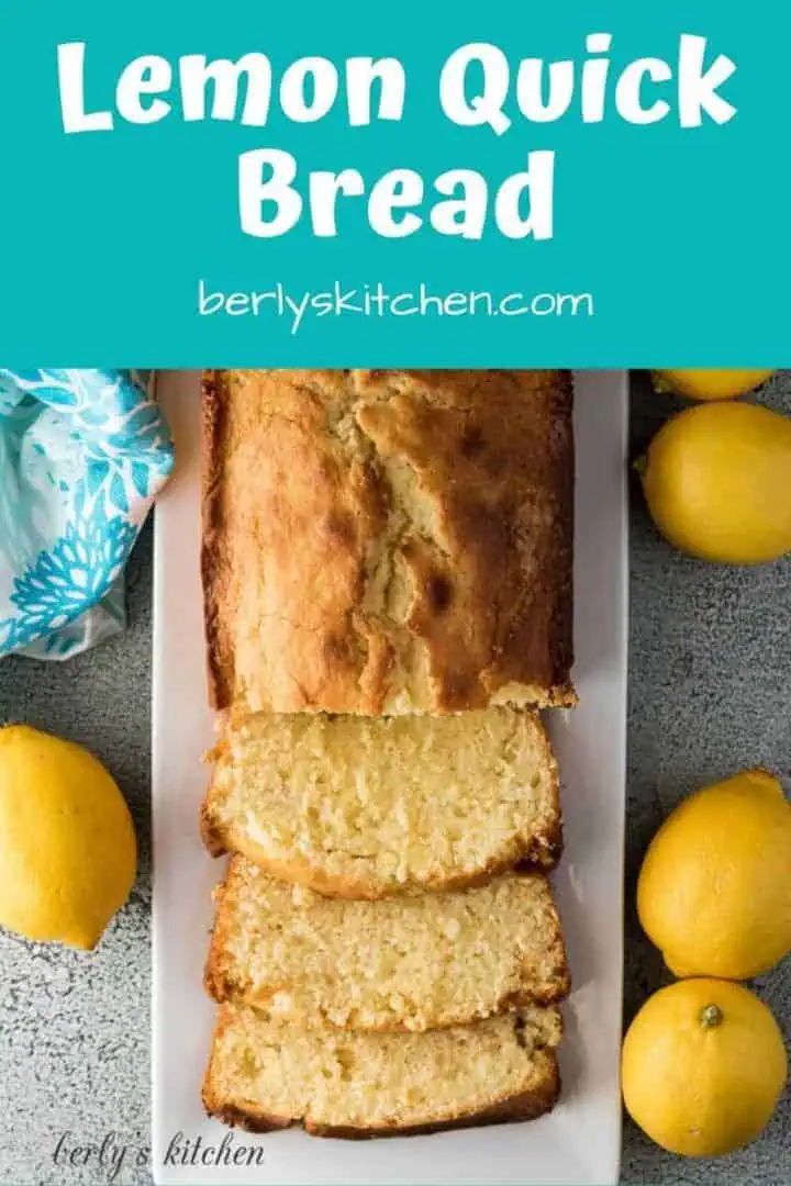 An aerial view of lemon quick bread partially cut into slices.