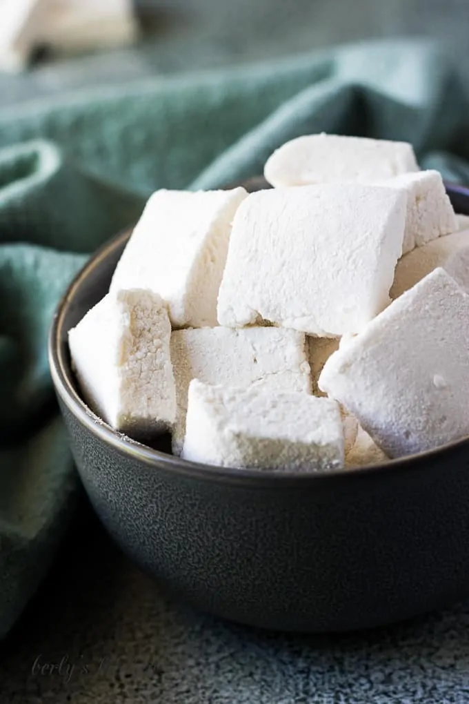 The square marshmallows served in a bowl.