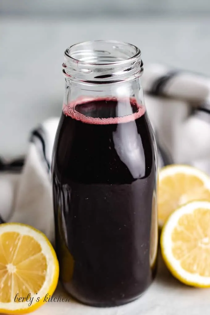 The finished syrup stored in a decorative milk bottle.