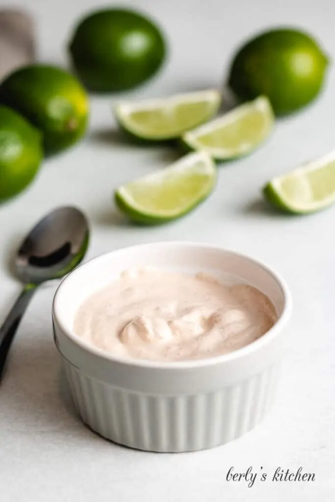 The chipotle sauce has been transferred to a ramekin.