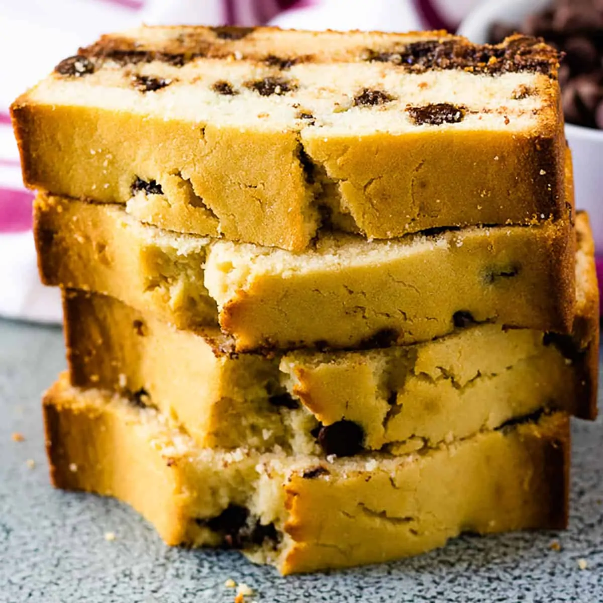 Stack of slices of chocolate chip loaf cake.