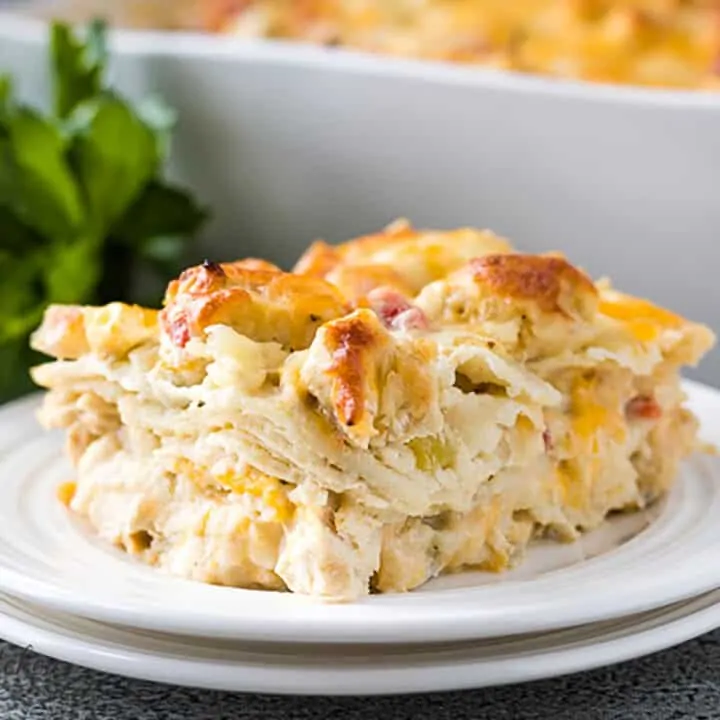 Slice of king chicken casserole on a white plate.