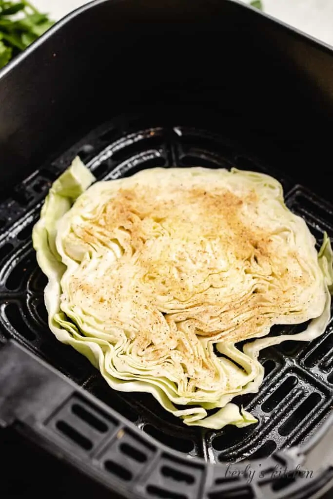 The cabbage steak placed into the machine.