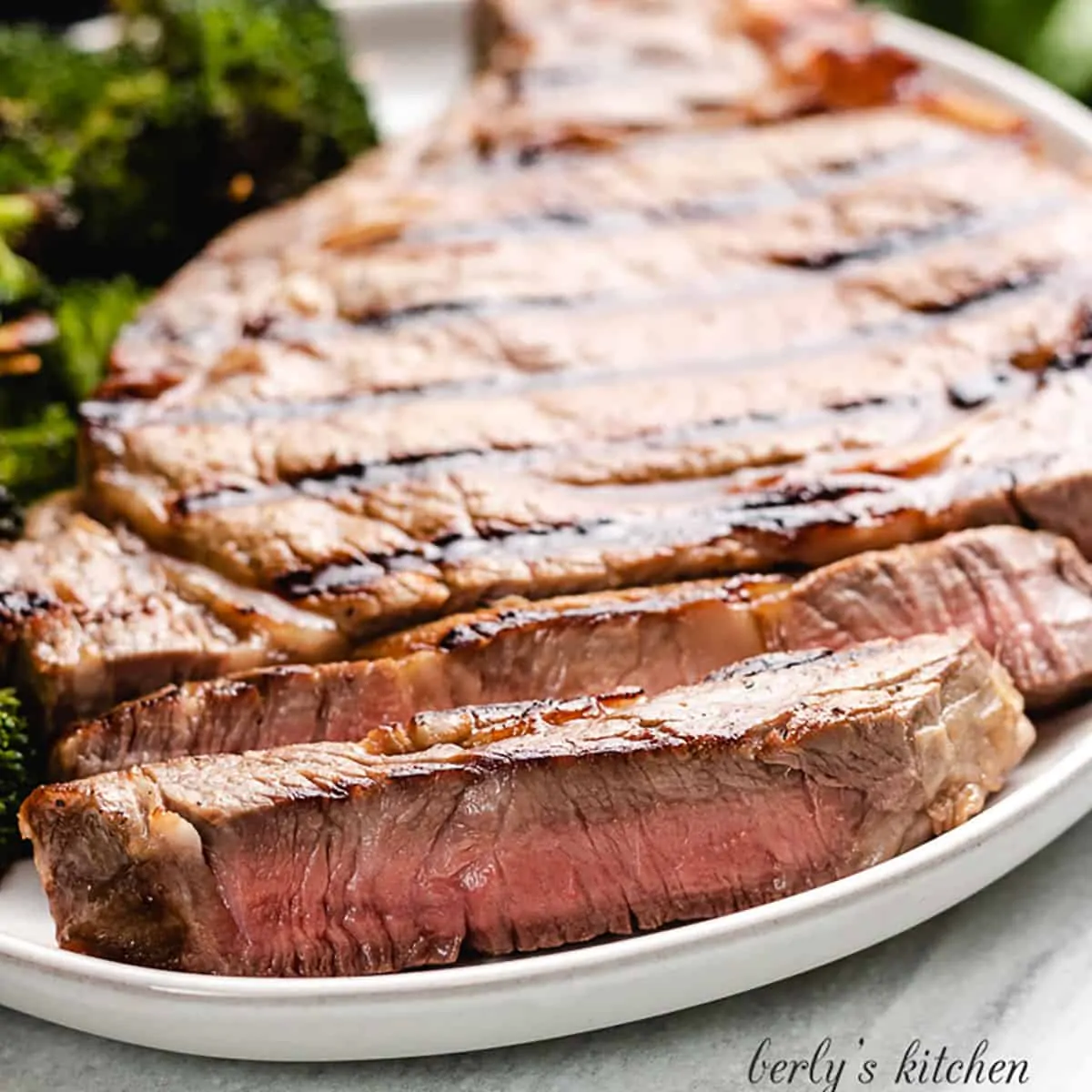 A large grilled steak marinated with the beer marinade.