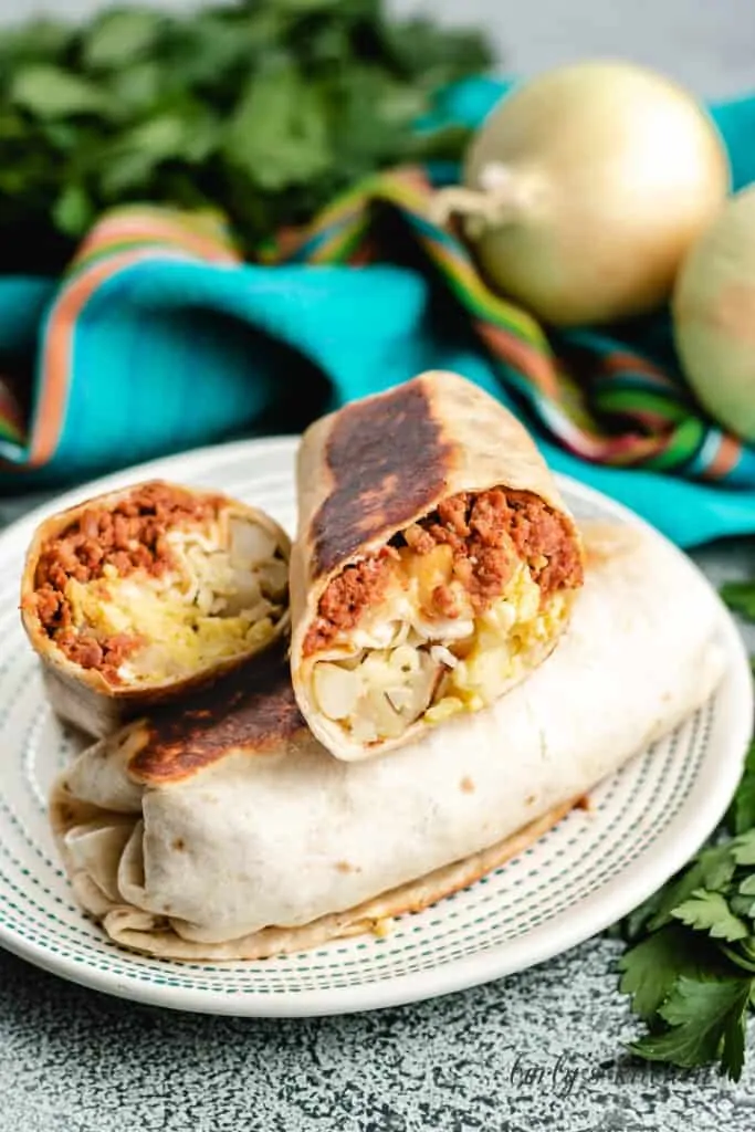 Burritos filled with sausage, eggs, potatoes, and cheese.