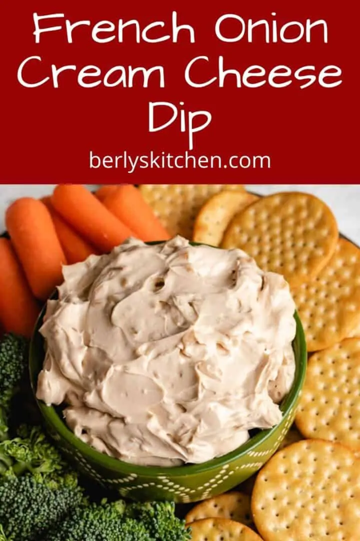 An aerial view of the cream cheese dip with crackers and veggies.