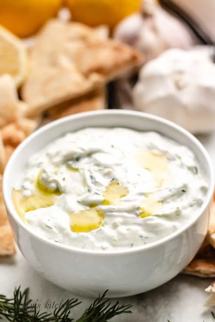 Close-up of the dip showing fresh dill.