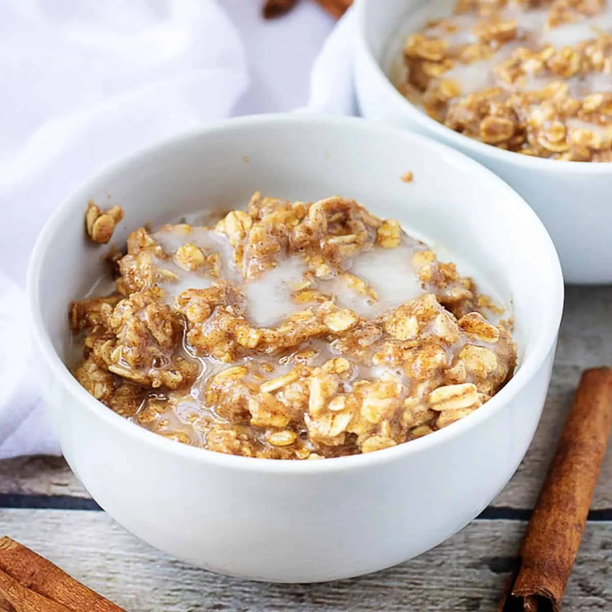 Two bowls of cinnamon oatmeal.