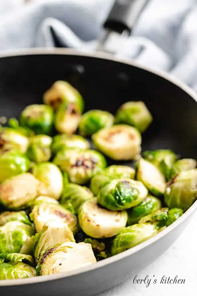 A close-up view of the vegetable in the pan.