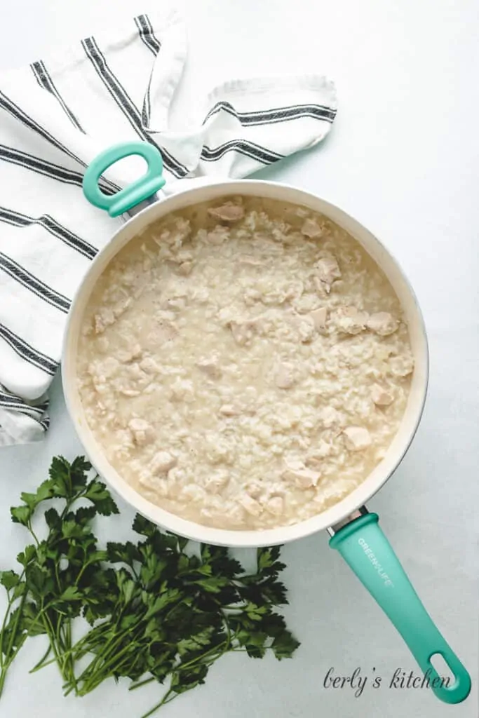 Dry rice added to the broth and soup.