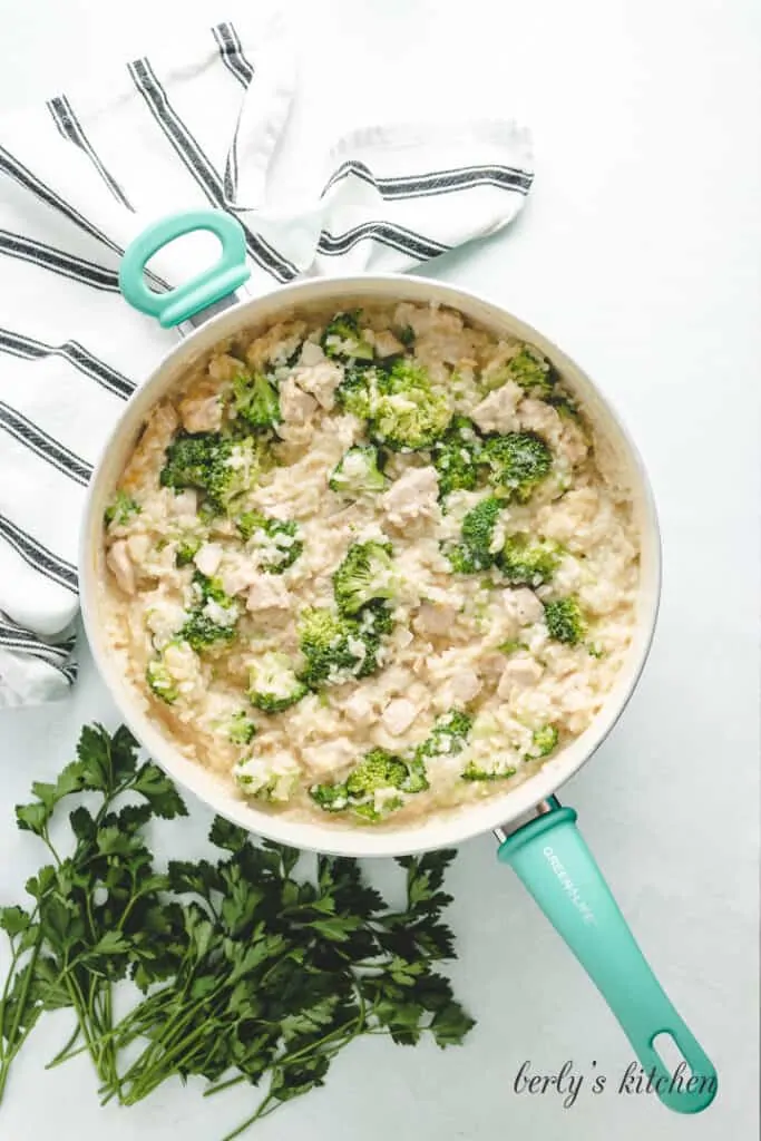 Broccoli florets added to the chicken and rice mixture.