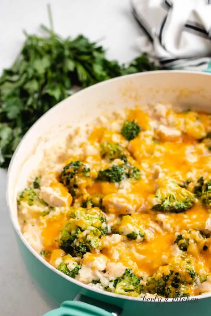 The finished cheesy rice broccoli and chicken in the pan..