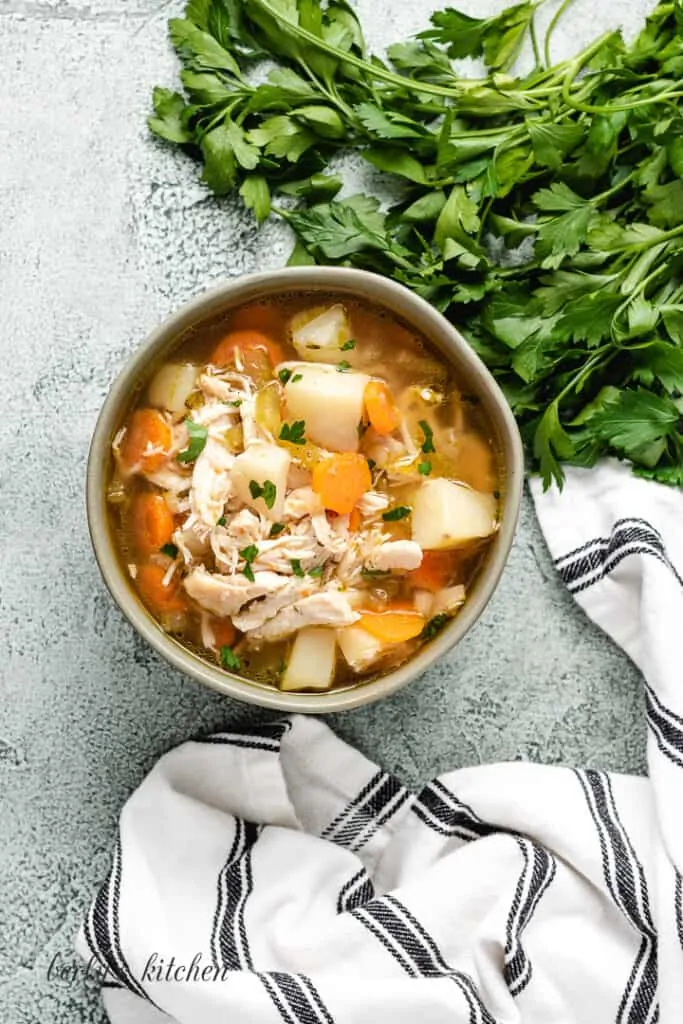 A top-view of the soup in a green bowl.